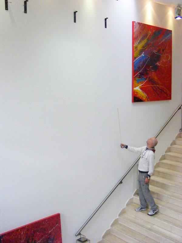 Hanging a big painting in a stairwell