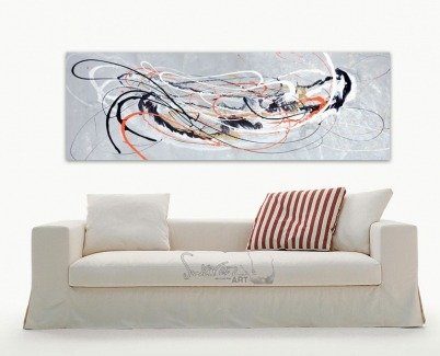 Orange and silver art and white sofa