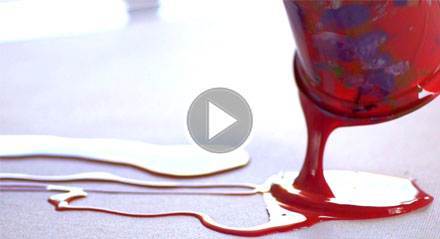 Pouring paint from a pot