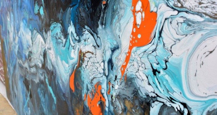 Orange and aqua colored paints