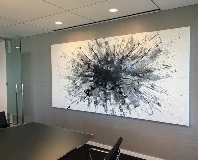 black and white modern art in corporate boardroom