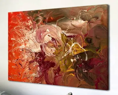 small-orange-art-hanging-above-a-sofa