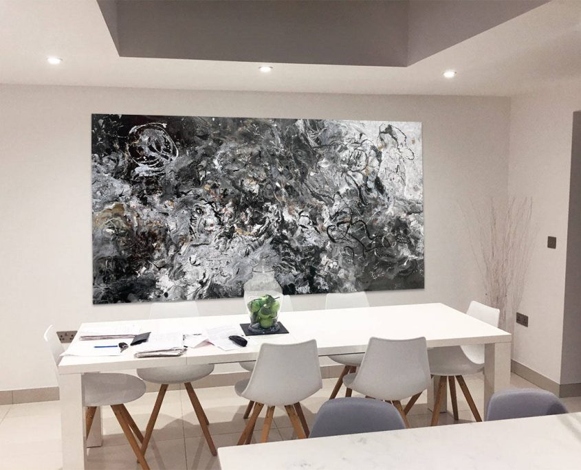 white dining room and black and white art