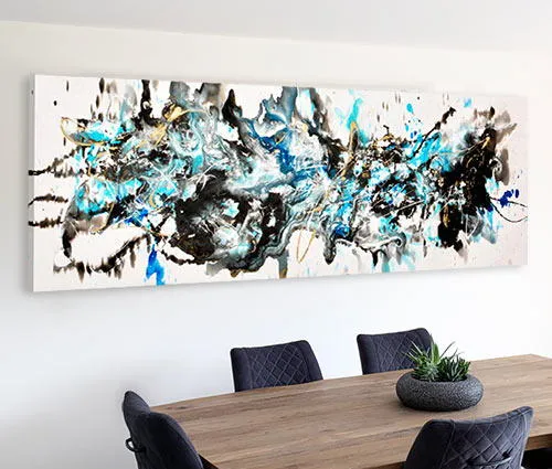 long abstract art above a dining table