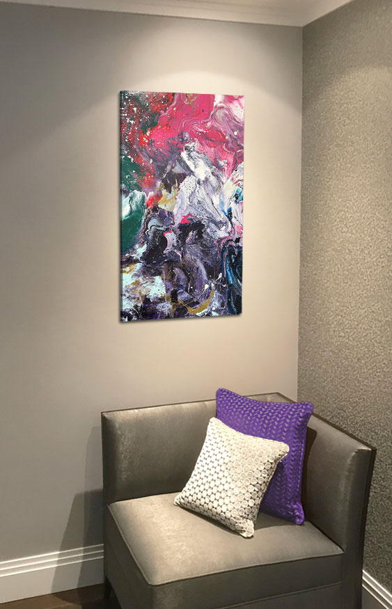 small abstract art above a square chair