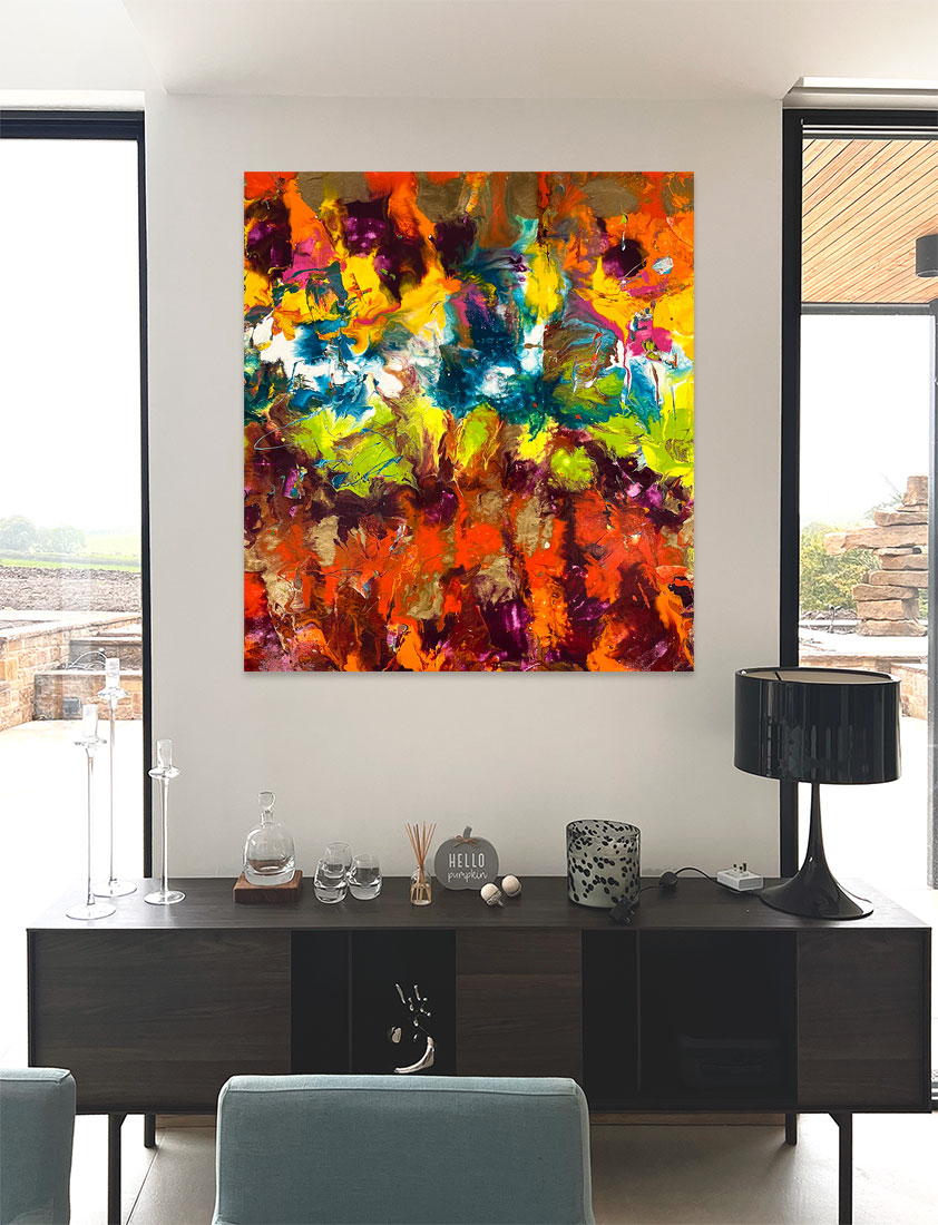 orange and maroon art hanging on a wall orange and maroon art hanging on a wall