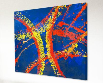 blue red and yellow art above a sofa