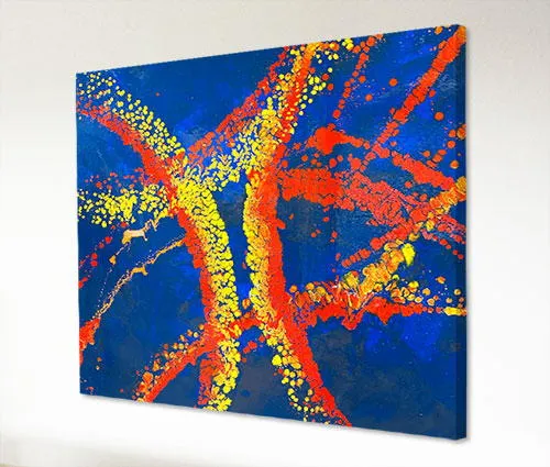 blue red and yellow art above a sofa