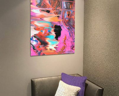 SAHARA-ACRYIC-PRINT orange pastel acrylic art print above a casual chair