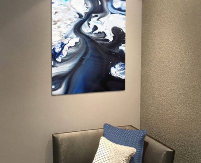 TIMOROUS-BEASTEIES-ACRYIC-PRINT black and blue acrylic art print above a casual chair