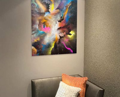 cosmos-art-print-above-a-chair